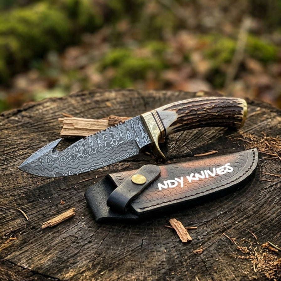 9" Hand-Forged Damascus Steel Skinning Knife – Fixed Blade Hunting Knife with Guthook, Genuine Staghorn Handle, Brass Guard & Premium Leather Sheath