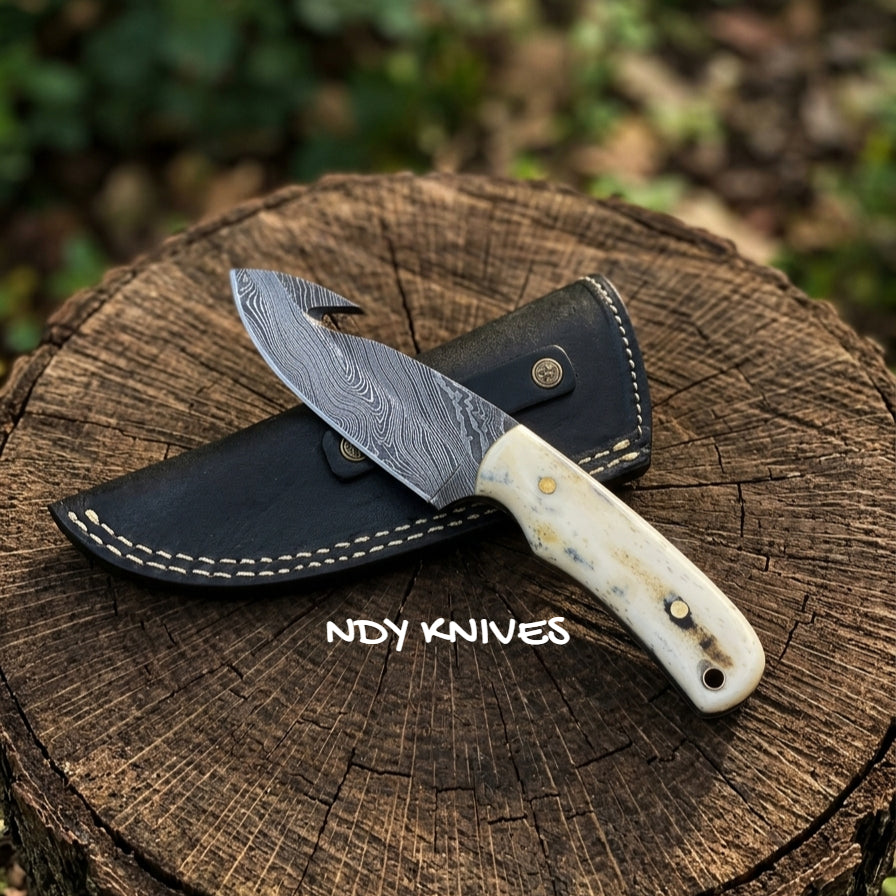 8" Hand-Forged Damascus Steel Skinning Knife – Fixed Blade Hunting Knife with Guthook, Natural Camel Bone Handle & Premium Leather Sheath